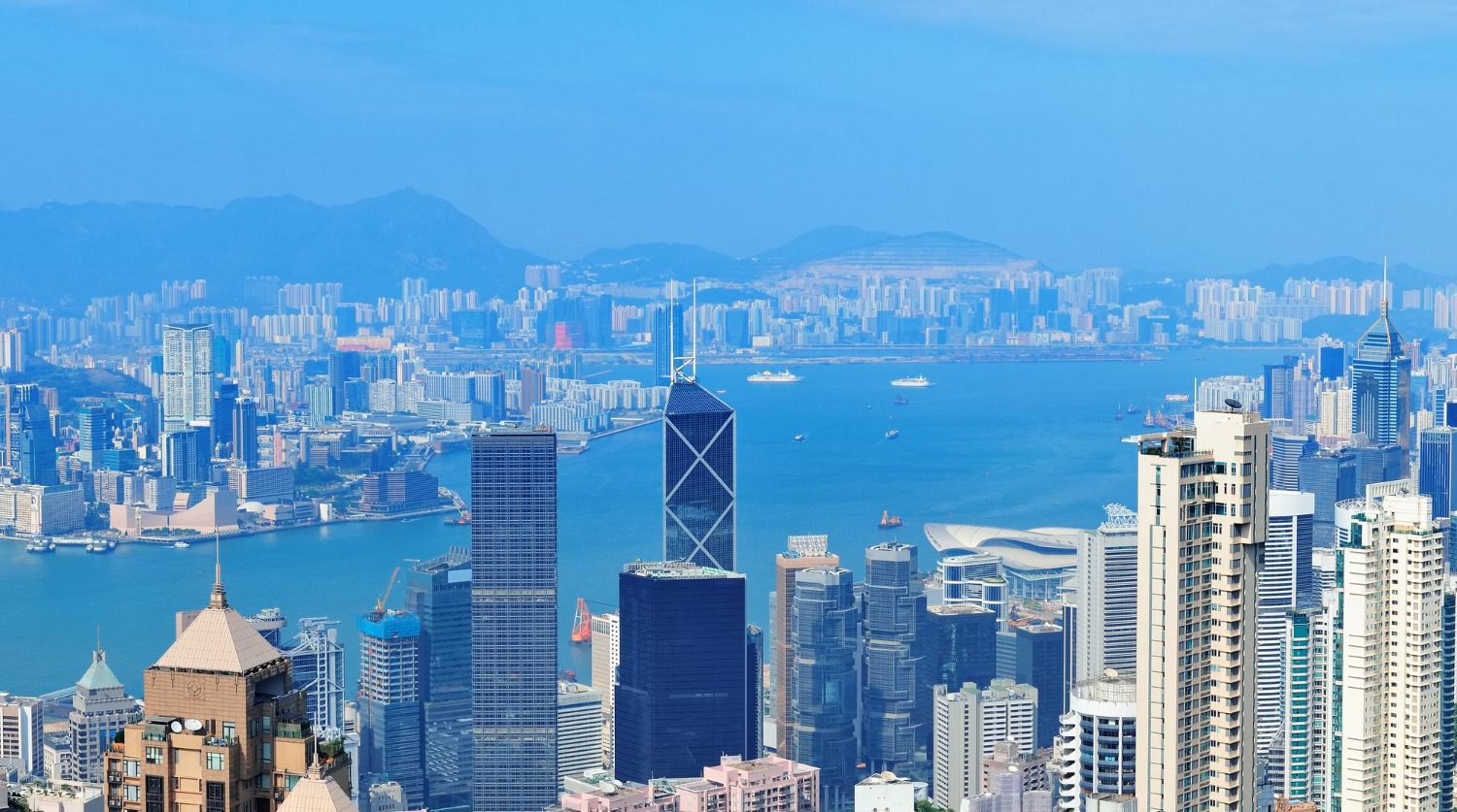 victoria harbor aerial view with hong kong skyline urban skyscrapers day